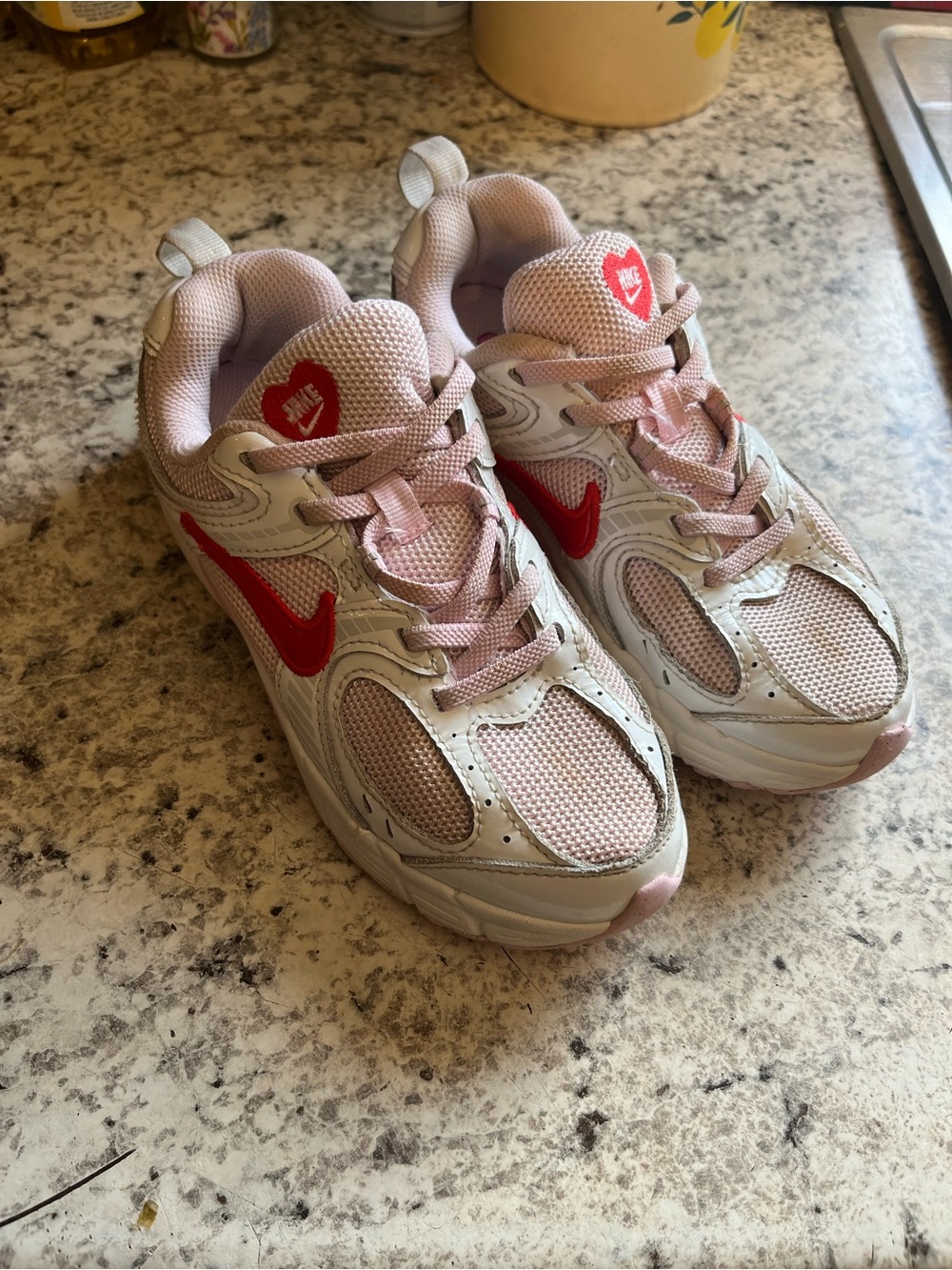 Nike Kids White and Pink Sneakers with Red Swoosh